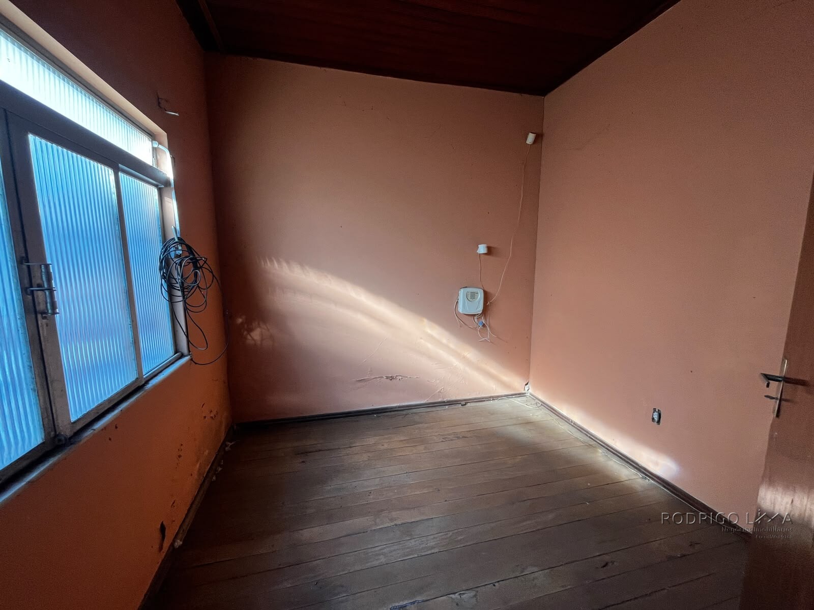 Lote com casa para venda no centro de São Lourenço Mg